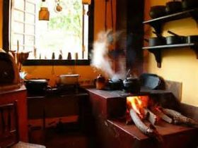 Old style wood burning stove in a Portuguese kitchen – Best Places In The World To Retire – International Living